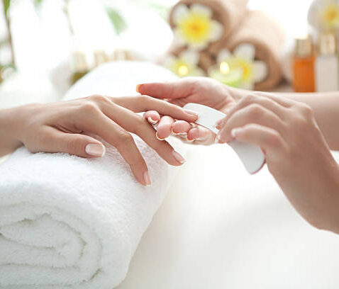 Close up of beautiful female hands having manicure treatment.See more MANICURE and SPA images. Click on image below for lightbox.